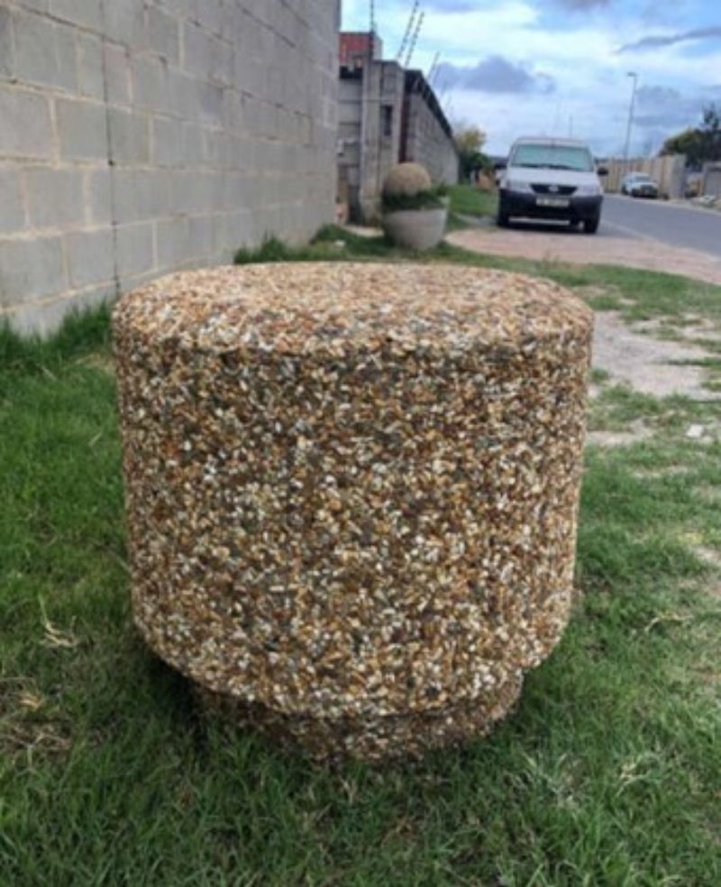 concrete-bollards-penny-bollard-on-verge-min