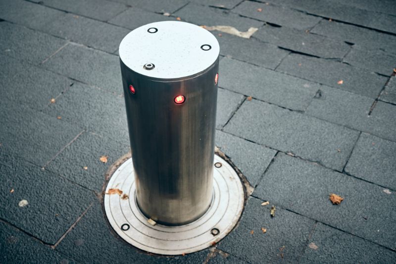 Concrete-bollards-can-be-retracted-into-the-roadway-to-allow-traffic-160220622-min