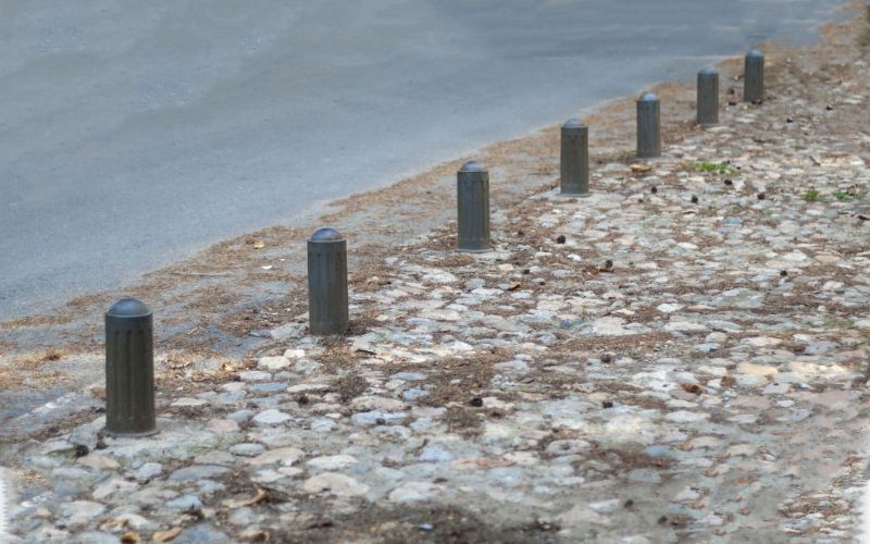 concrete-bollards-next-to-road-min