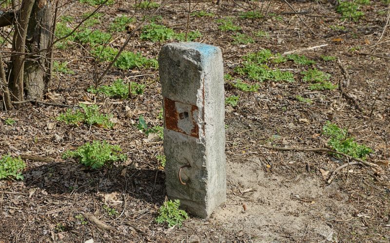 concrete-bollards-one-old-gray-concrete-restraining-post-min